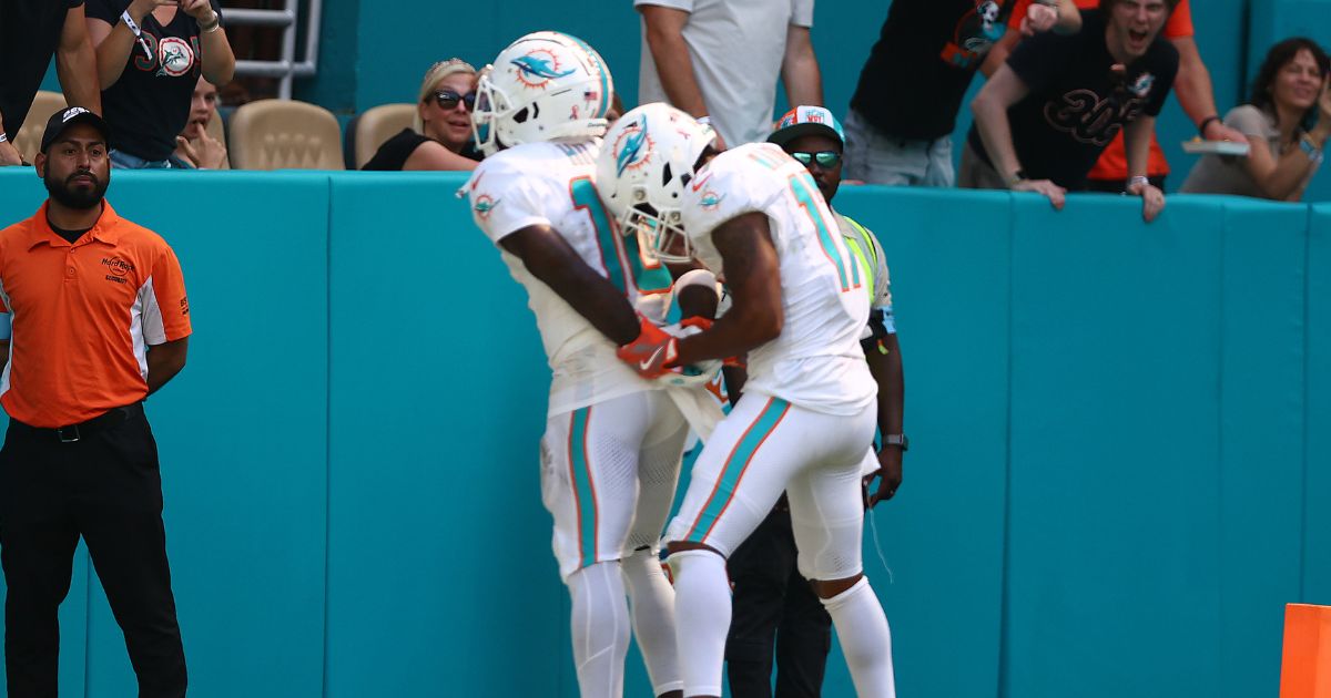 Tyreek Hill #10 of the Miami Dolphins and Jaylen Waddle #17 of the Miami Dolphins celebrate after Hill's receiving touchdown during the third quarter against the Jacksonville Jaguars at Hard Rock Stadium on September 8, 2024 in Miami Gardens, Florida.