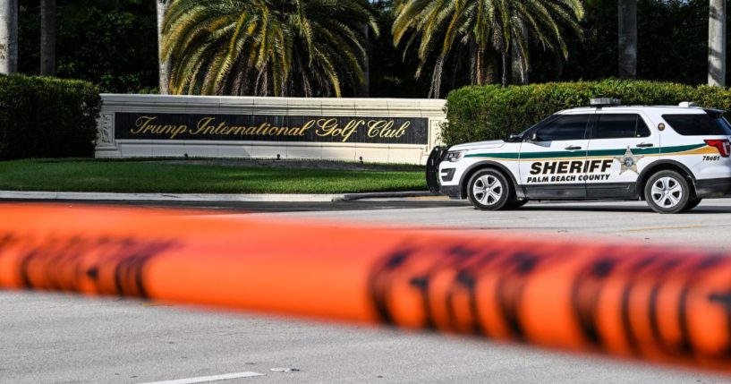 A sheriff's car blocks the street outside the Trump International Golf Club in West Palm Beach, Florida, on September 15, 2024 following a shooting incident at former US president Donald Trump's golf course. (Chandan Khanna - AFP / Getty Images)