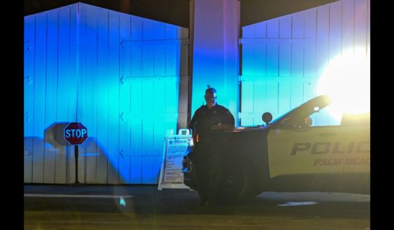 A police car is seen outside former US President Donald Trump's residence in Mar-A-Lago, Palm Beach, Florida on August 8, 2022. Former US president Donald Trump said August 8, 2022 that his Mar-A-Lago residence in Florida was being raided by FBI agents in an act of 