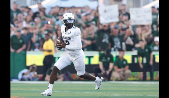 Shedeur Sanders #2 of the Colorado Buffaloes runs with the ball during the second quarter against the Colorado State Rams at Canvas Stadium on September 14, 2024 in Fort Collins, Colorado.