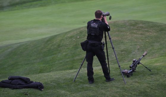 A US Secret Service agent mans his post before former US President and Republican presidential candidate Donald Trump speaks at press conference at Trump National Golf Club Los Angeles in Rancho Palos Verdes, California, on September 13, 2024.