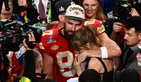 US singer-songwriter Taylor Swift and Kansas City Chiefs' tight end #87 Travis Kelce embrace after the Chiefs won Super Bowl LVIII against the San Francisco 49ers at Allegiant Stadium in Las Vegas, Nevada, February 11, 2024.