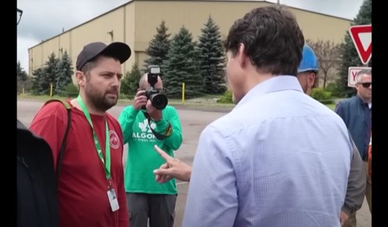 This YouTube screen shot shows Canadian Prime Minister Justin Trudeau speaking to a steel worker in Canada.