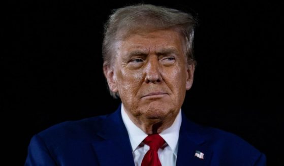 Former US President and Republican presidential nominee Donald Trump listens to questions during a Town Hall event at Macomb Community College on September 27, 2024 in Warren, Michigan.