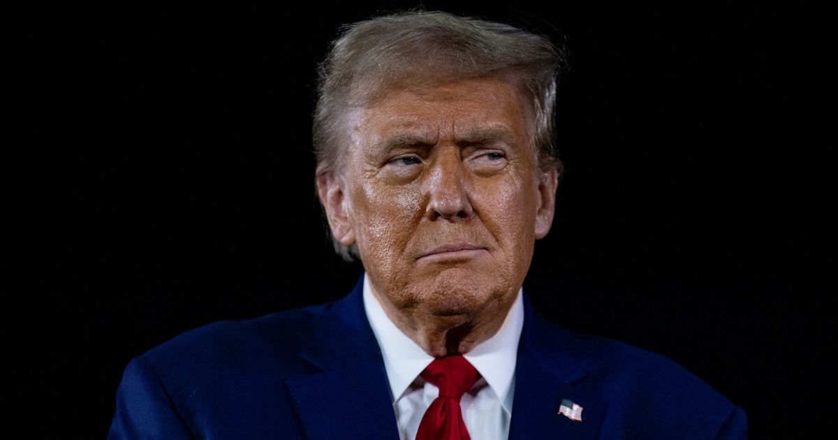 Former US President and Republican presidential nominee Donald Trump listens to questions during a Town Hall event at Macomb Community College on September 27, 2024 in Warren, Michigan.