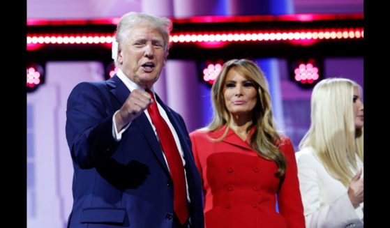 Republican presidential candidate, former U.S. President Donald Trump and Former first lady Melania Trump on stage and the conclusion of the fourth day of the Republican National Convention at the Fiserv Forum on July 18, 2024 in Milwaukee, Wisconsin.