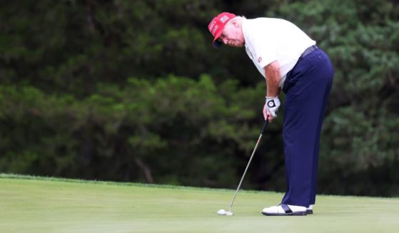 Former President Donald Trump putts on the fourth green during the pro-am prior to the LIV Golf Invitational - Bedminster at Trump National Golf Club on August 10, 2023 in Bedminster, New Jersey.