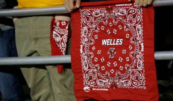 Boston College Eagles fan holds a red bandana to honor Boston College alumni Welles Crowther during the first quarter of the game between the Eagles and the Florida State Seminoles at Alumni Stadium on October 27, 2017 in Chestnut Hill, Massachusetts.