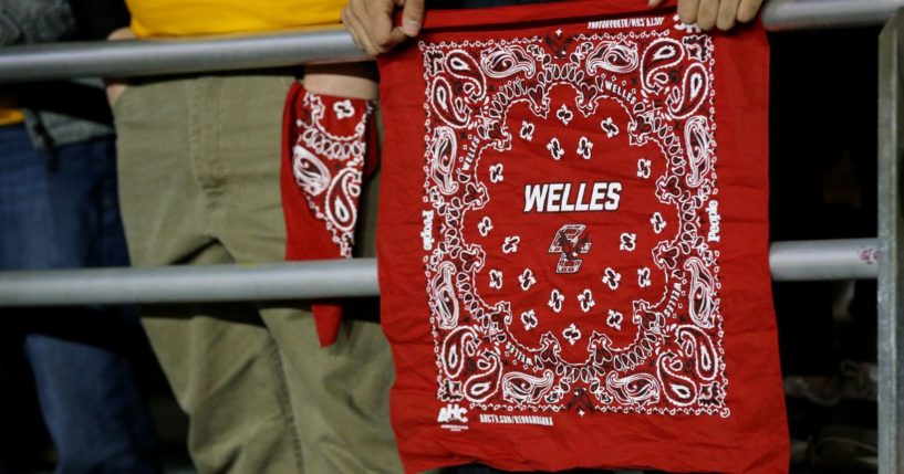 Boston College Eagles fan holds a red bandana to honor Boston College alumni Welles Crowther during the first quarter of the game between the Eagles and the Florida State Seminoles at Alumni Stadium on October 27, 2017 in Chestnut Hill, Massachusetts.