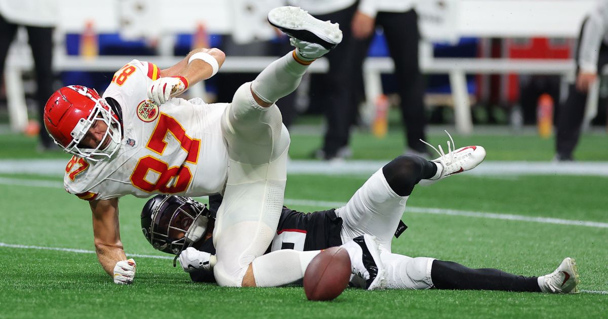 Jessie Bates III #3 of the Atlanta Falcons breaks up a pass intended for Travis Kelce #87 of the Kansas City Chiefs during the fourth quarter at Mercedes-Benz Stadium on September 22, 2024 in Atlanta, Georgia.