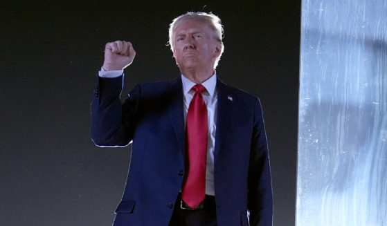 Former President Donald Trump gestures as he concludes speaking at a campaign event at the Butler Farm Show in Butler, Pennsylvania, on Oct. 5.