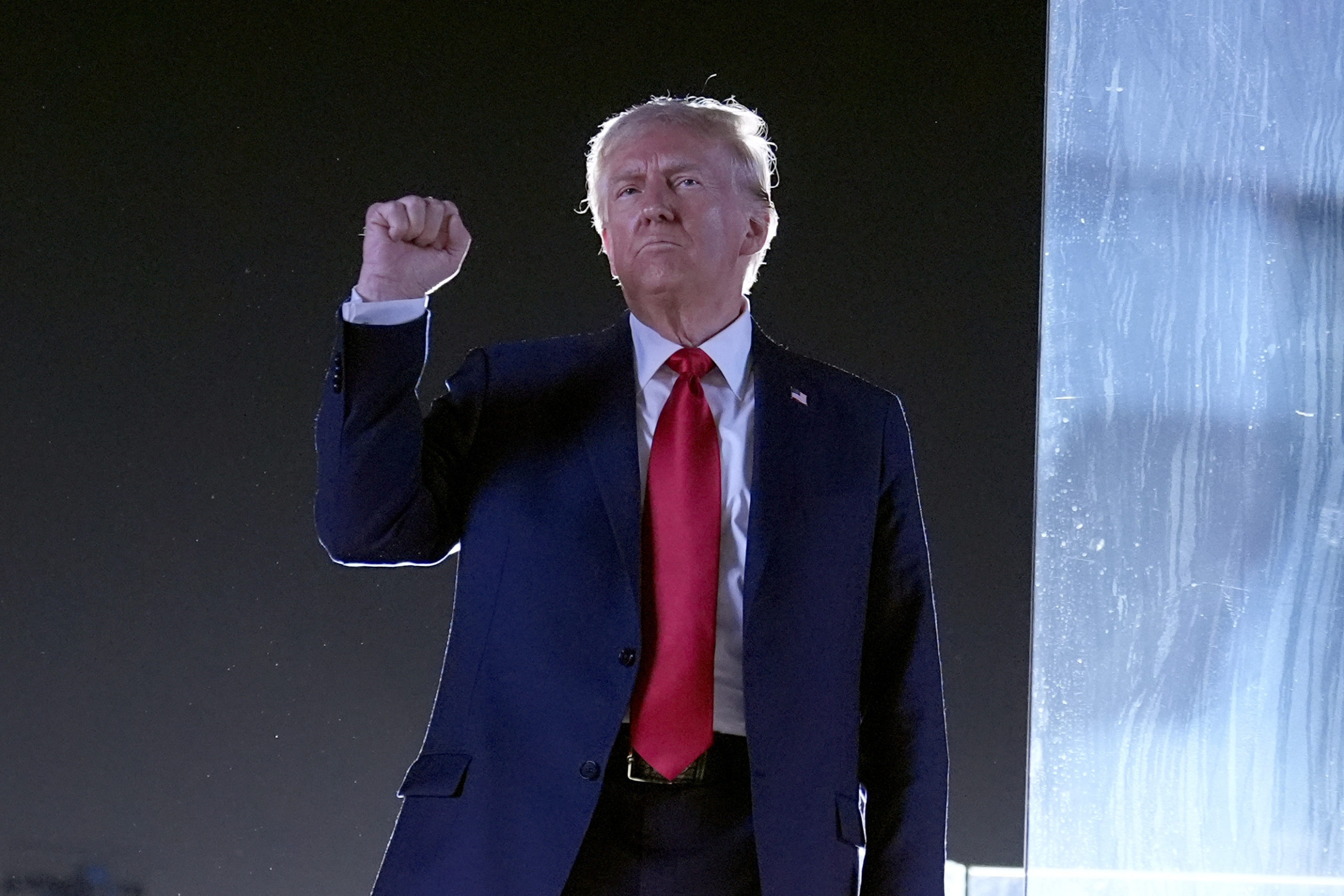 Former President Donald Trump gestures as he concludes speaking at a campaign event at the Butler Farm Show in Butler, Pennsylvania, on Oct. 5.