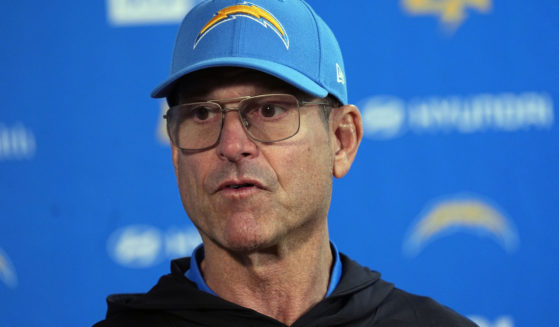 Los Angeles Chargers head coach Jim Harbaugh responds to a question during news conference after defeating the Denver Broncos in Denver, Colorado, on Sunday.