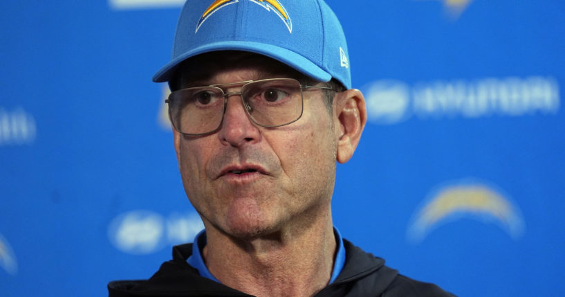 Los Angeles Chargers head coach Jim Harbaugh responds to a question during news conference after defeating the Denver Broncos in Denver, Colorado, on Sunday.