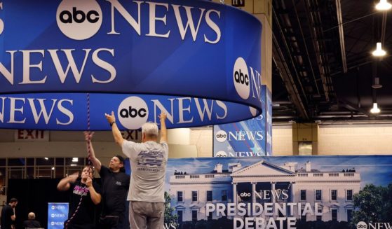 ABC News signage is installed in the media file center inside the Pennsylvania Convention Center in Philadelphia on Sept. 9, one day before the presidential debate.