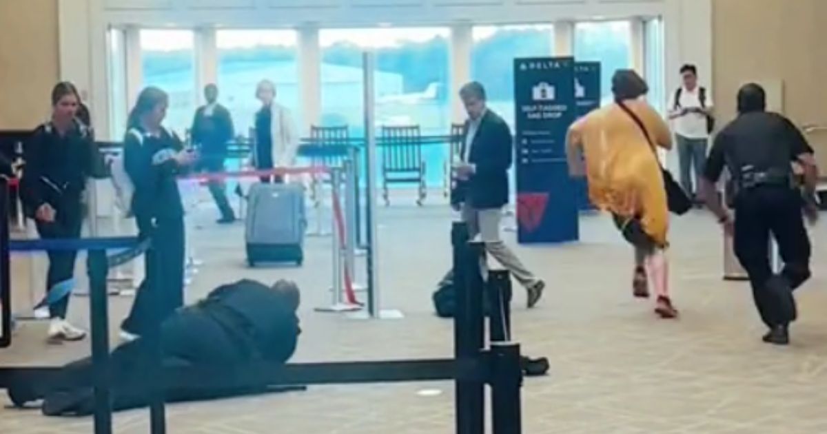 Unhinged Delta Airport Customer Goes on a Rampage, Screams ‘I Will Kill You’ at Cops in Viral Video