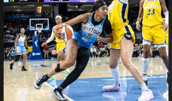 Angel Reese of the Chicago Sky drives into the paint against the Los Angeles Sparks during the first quarter at Wintrust Arena on Sept.6, in Chicago, Illinois. Reese remarked this week that her five-figure WNBA salary doesn't even come close to paying her bills.