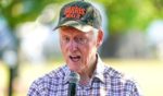 Former President Bill Clinton speaks in support of the Harris-Walz presidential campaign during the Fort Valley GOTV Community Fish Fry in Fort Valley, Georgia, on Sunday.