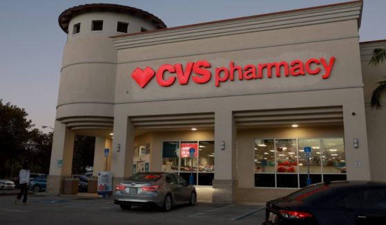 A Miami, Florida, CVS pharmacy store is pictured in a file photo from Feb. 7. The company is looking at laying off 2,900 employees, after laying off 5,000 last year.