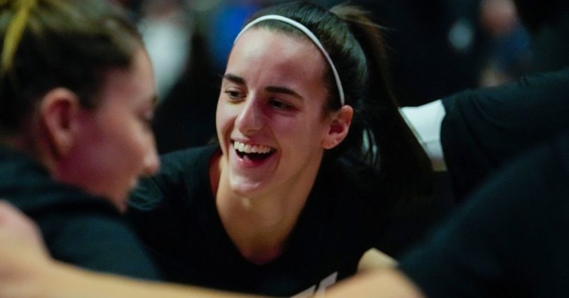 Caitlin Clark of the Indiana Fever huddles with teammates before playing the Connecticut Sun in Game Two of the 2024 WNBA Playoffs first round in Uncasville, Connecticut, on Sept. 25.