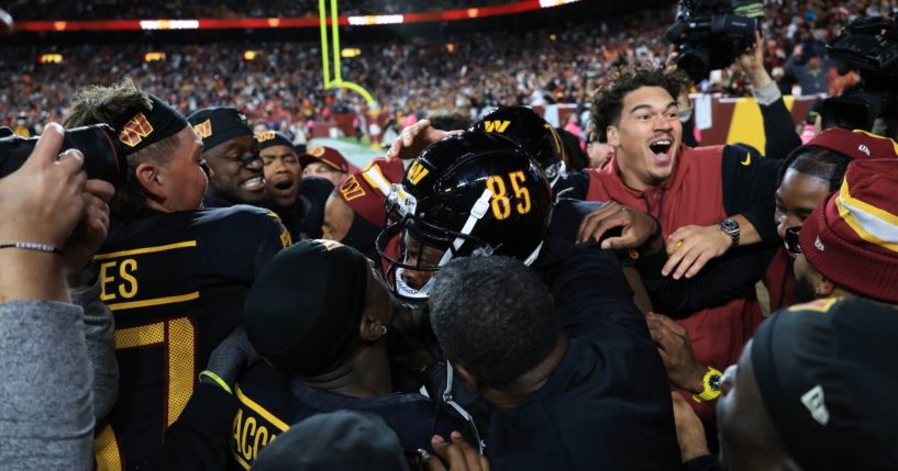 Noah Brown of the Washington Commanders celebrates his game-winning touchdown reception against the Chicago Bears in Landover, Maryland, on Sunday.