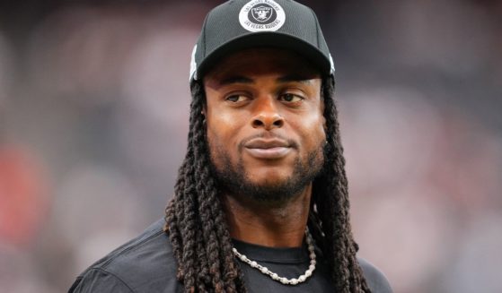 Wide receiver Davante Adams of the Las Vegas Raiders walks the sidelines before the game against the Cleveland Browns in Las Vegas, Nevada, on Sunday.