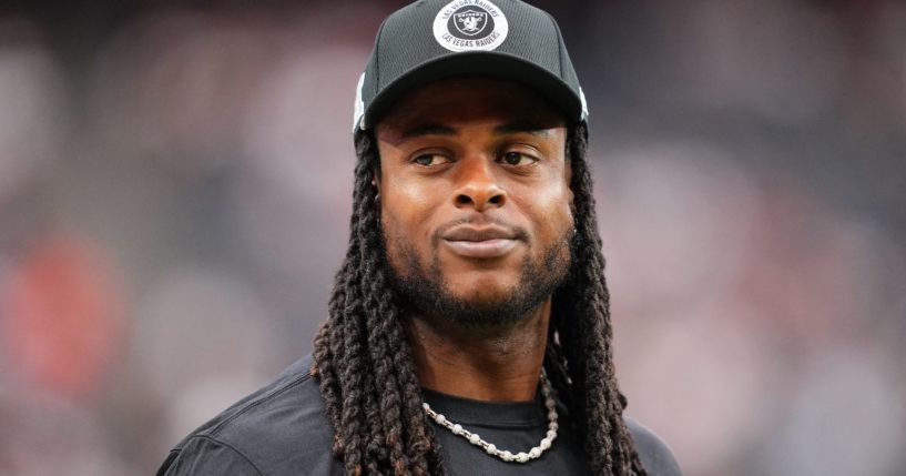 Wide receiver Davante Adams of the Las Vegas Raiders walks the sidelines before the game against the Cleveland Browns in Las Vegas, Nevada, on Sunday.