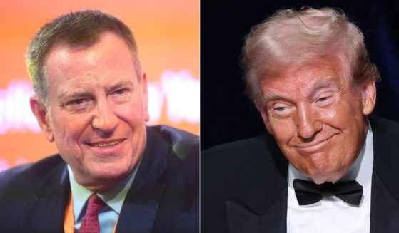 During the Al Smith Dinner in New York City on Thursday, former President Donald Trump, right, used part of his speech to go after former NYC Mayor Bill de Blasio, left.