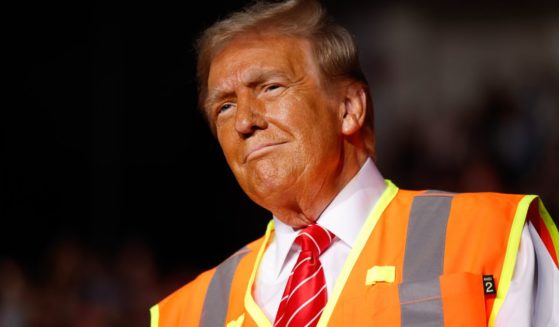 Former President Donald Trump arrives for a campaign rally in Green Bay, Wisconsin, on Wednesday.