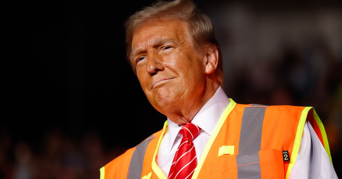 Former President Donald Trump arrives for a campaign rally in Green Bay, Wisconsin, on Wednesday.