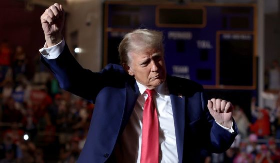 Former President Donald Trump dances while entering a campaign rally in Greenville, North Carolina, on Monday.