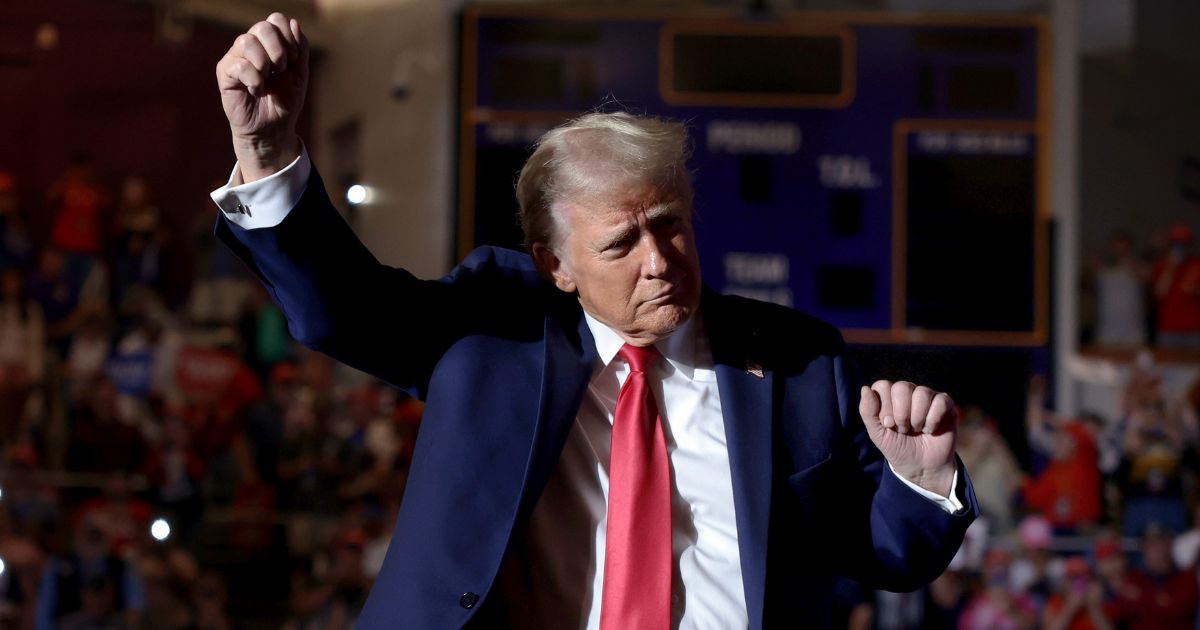 Former President Donald Trump dances while entering a campaign rally in Greenville, North Carolina, on Monday.