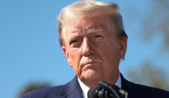 Former President Donald Trump delivers remarks as he visits a neighborhood affected by Hurricane Helene in Swannanoa, North Carolina, on Monday.