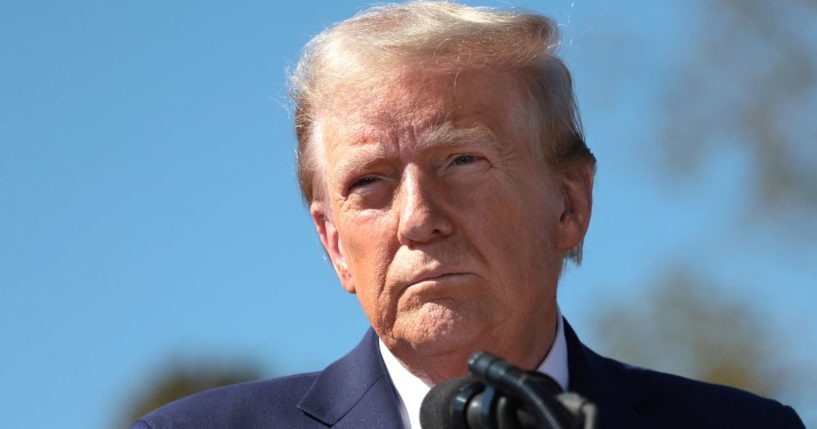 Former President Donald Trump delivers remarks as he visits a neighborhood affected by Hurricane Helene in Swannanoa, North Carolina, on Monday.