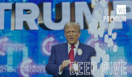 Former President Donald Trump arrives on stage for a Turning Point PAC campaign rally in Duluth, Georgia, on Wednesday.