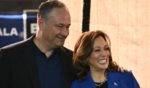 Vice President Kamala Harris, right, and second gentleman Douglas Emhoff, left, look on during a campaign event in Rochester, Pennsylvania, on Aug. 18.