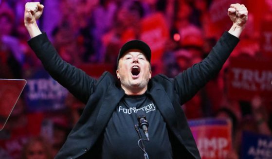 Tesla and SpaceX CEO Elon Musk gestures as he steps on stage during a rally for former President Donald Trump at Madison Square Garden in New York City on Sunday.