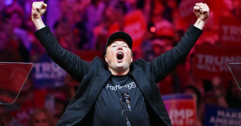 Tesla and SpaceX CEO Elon Musk gestures as he steps on stage during a rally for former President Donald Trump at Madison Square Garden in New York City on Sunday.