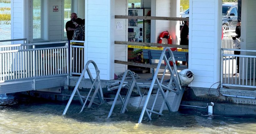 A portion of the gangway which collapsed Saturday afternoon remains visible on Sapelo Island, Georgia, on Sunday.