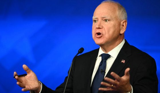 Gov. Tim Walz gestures during the vice presidential debate against Sen. J.D. Vance in New York City on Tuesday.