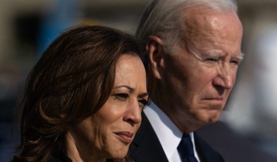 Vice President Kamala Harris, left, and President Joe Biden attend a wreath-laying ceremony at the Pentagon in Washington, D.C., on Sept. 11.