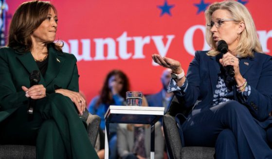 Vice President Kamala Harris, left, and former Rep. Liz Cheney, right, speak at a town hall in Royal Oak, Michigan, on Monday.