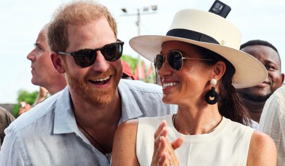 Prince Harry, Duke of Sussex, and Meghan, Duchess of Sussex, are pictured in San Basilio de Palenque during their trip to Colombia on Aug. 17.