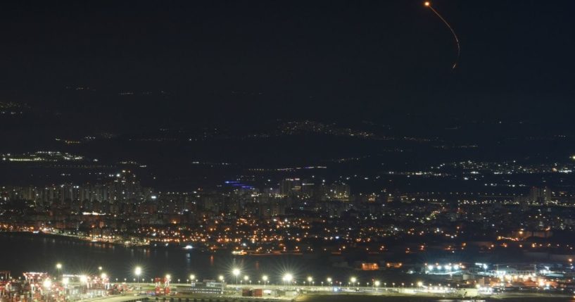 Israeli Iron Dome air defense system fires to intercept rockets that were launched from Lebanon in Haifa on Monday.