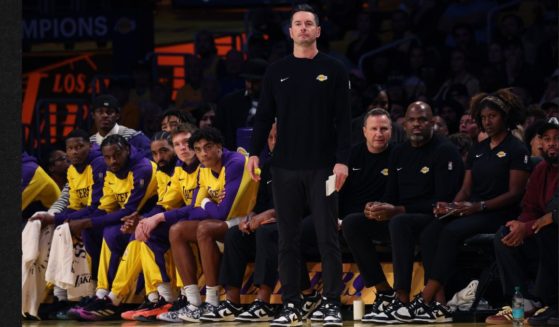 Head coach JJ Redick of the Los Angeles Lakers watches his team during the first quarter against the Minnesota Timberwolves at Crypto.com Arena Tuesday in Los Angeles.