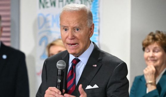 President Joe Biden speaks to staff as he visits a New Hampshire Democratic coordinated campaign office in Concord, New Hampshire, on Tuesday.