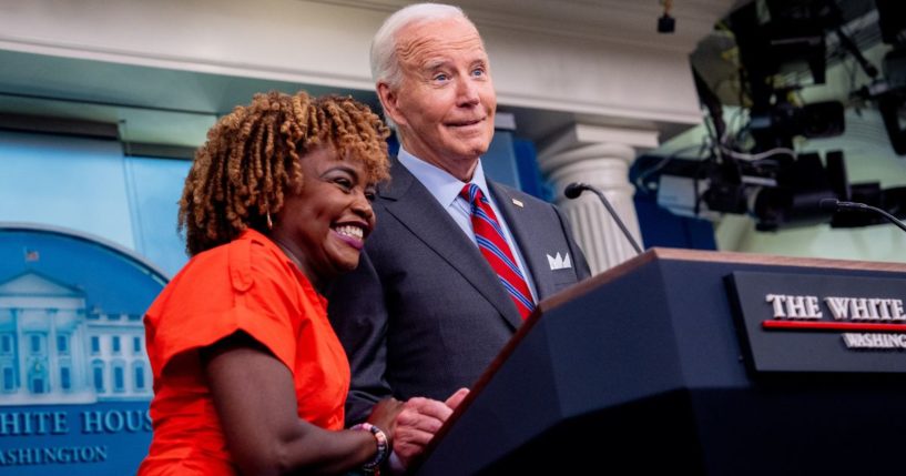 President Joe Biden, accompanied by White House press secretary Karine Jean-Pierre, jokes about taking so many questions during a news conference in the Brady Press Briefing Room at the White House in Washington, D.C., on Friday.