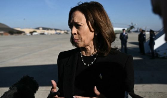 Vice President Kamala Harris talks to reporters before boarding Air Force Two at Joint Base Andrews in Maryland on Wednesday.