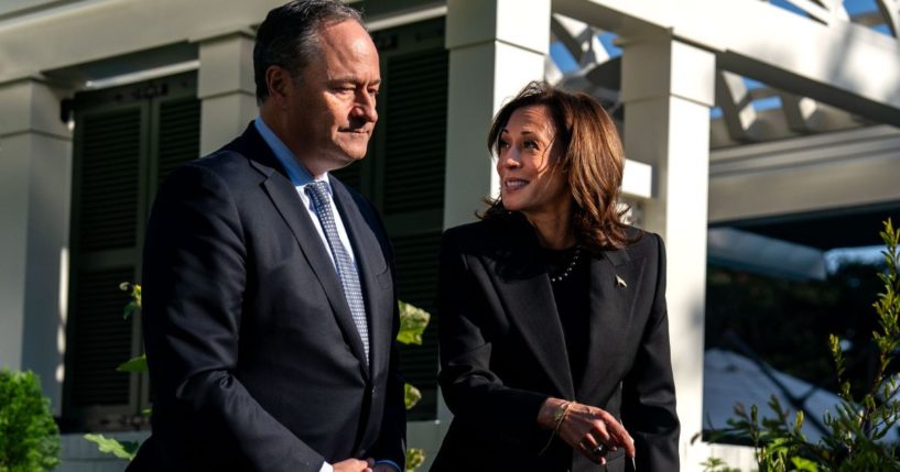 Second gentleman Doug Emhoff, left, and Vice President Kamala Harris, right, plant a pomegranate tree at the Vice President's residence at the U.S. Naval Observatory in Washington, D.C., on Monday.