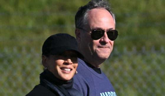 Vice President Kamala Harris, left, and second gentleman Doug Emhoff walk around the Pennsylvania Air National Guard Base, 171st Air Refueling Wing, in Moon Township, Pennsylvania, on Sept. 8.